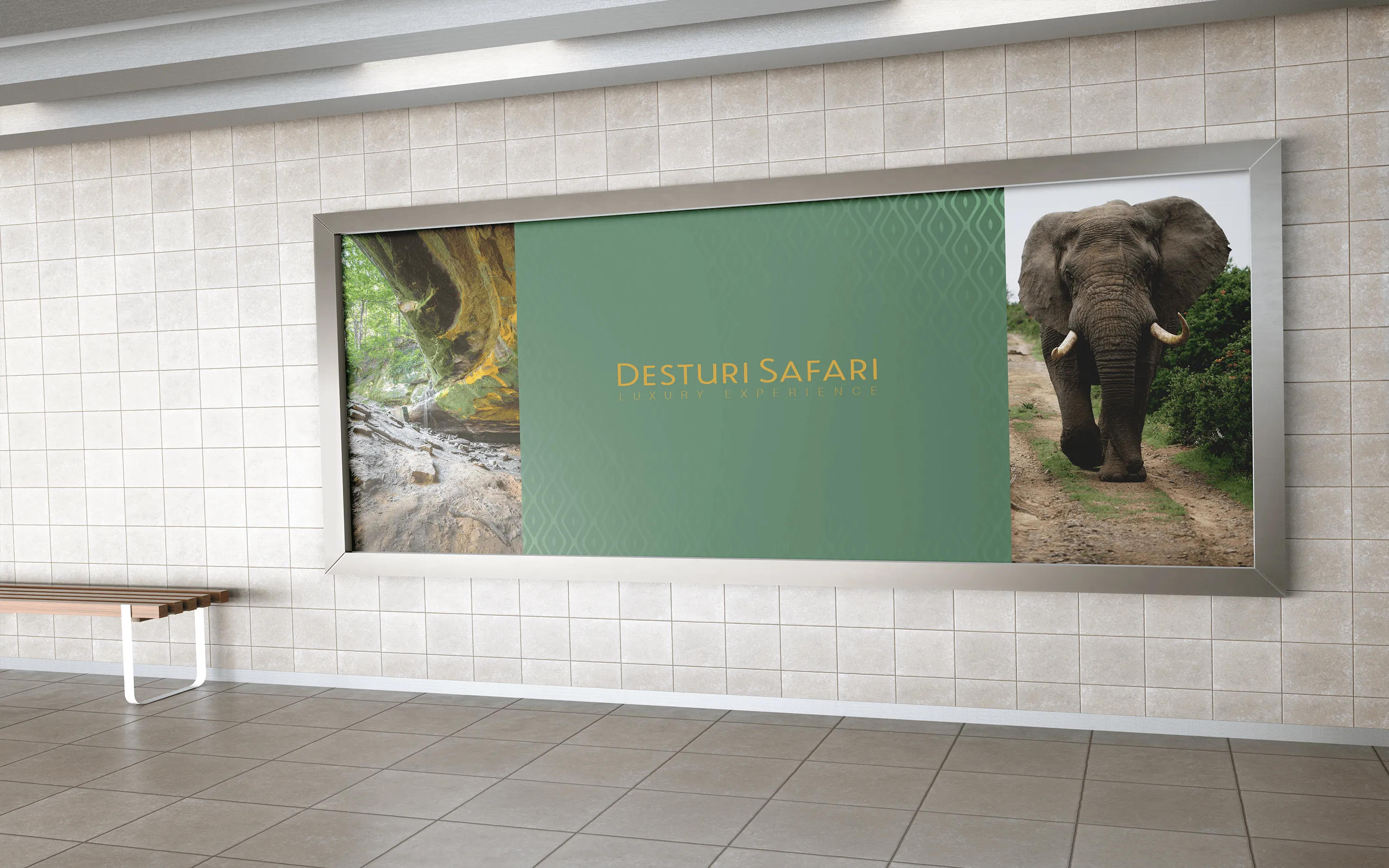 Framed advertisement with cave scene, text 'Desturi Safari Luxury Experience', and an elephant on a dirt path.